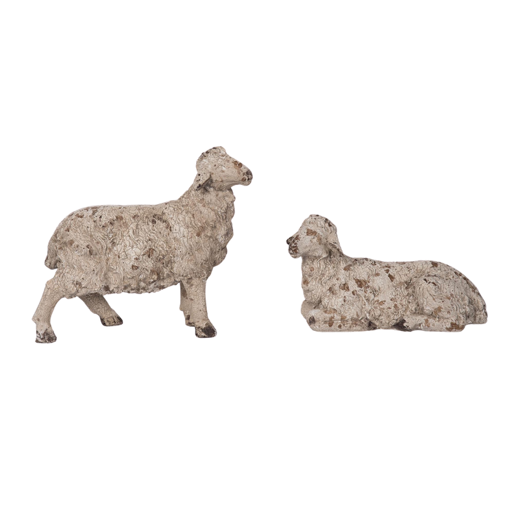 Resin decorative lamb figurine in natural tone with smooth sculpted curves.