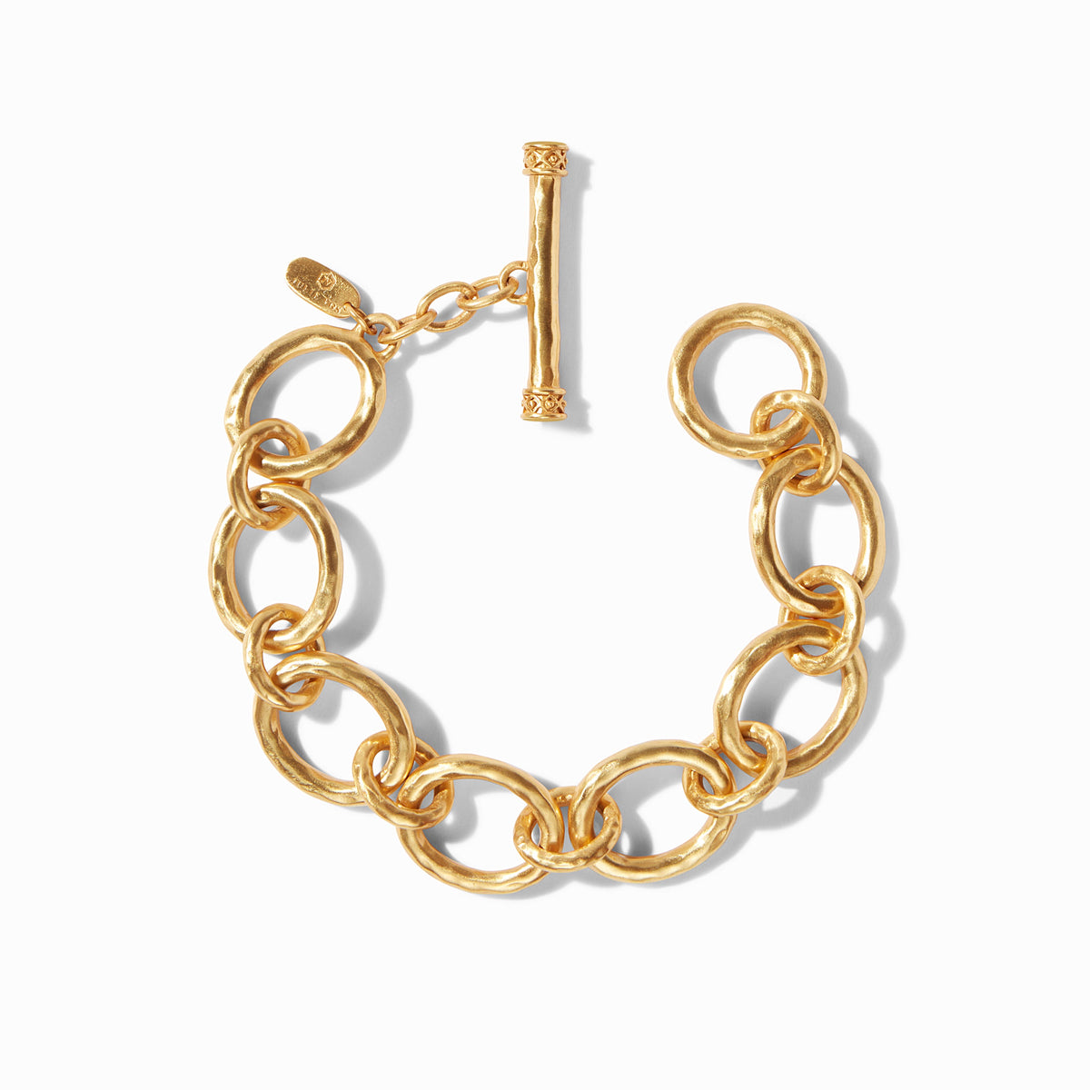 Catalina Demi Link Bracelet in gold with hammered links and a toggle closure.