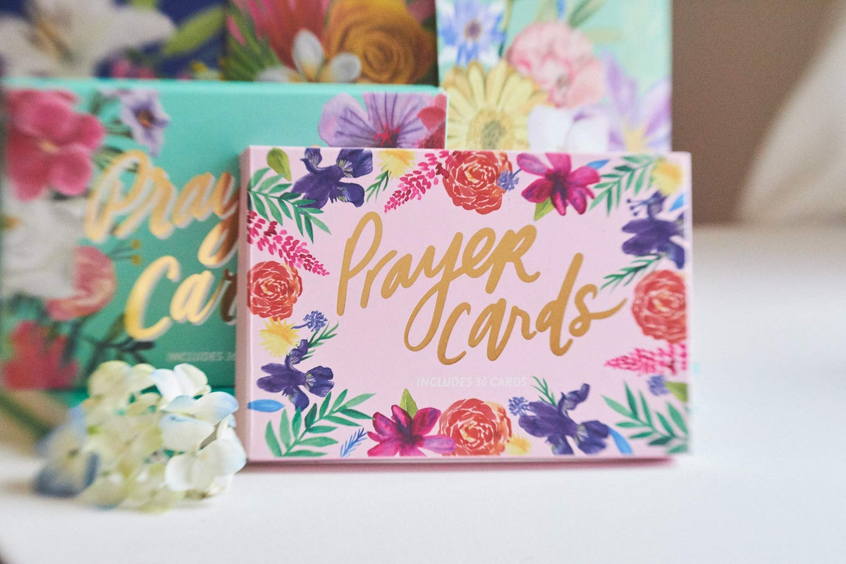 Set of floral wreath prayer cards with inspirational messages.