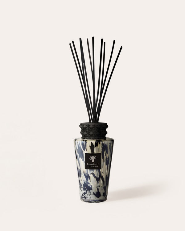 Totem Black Pearls 2L diffuser with a black and white marbled glass bottle and black reeds.