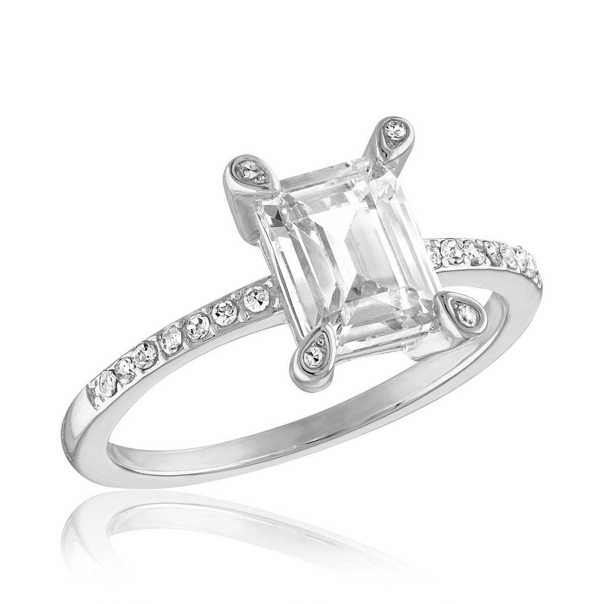 Emerald cut stack ring in silver metal with a sleek modern silhouette.