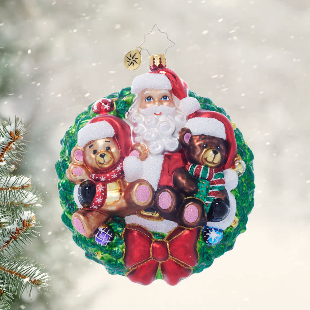 Dave Thomas Adoption Foundation wreath ornament with red berries, green leaves, gold accents, and a heart-shaped cutout.