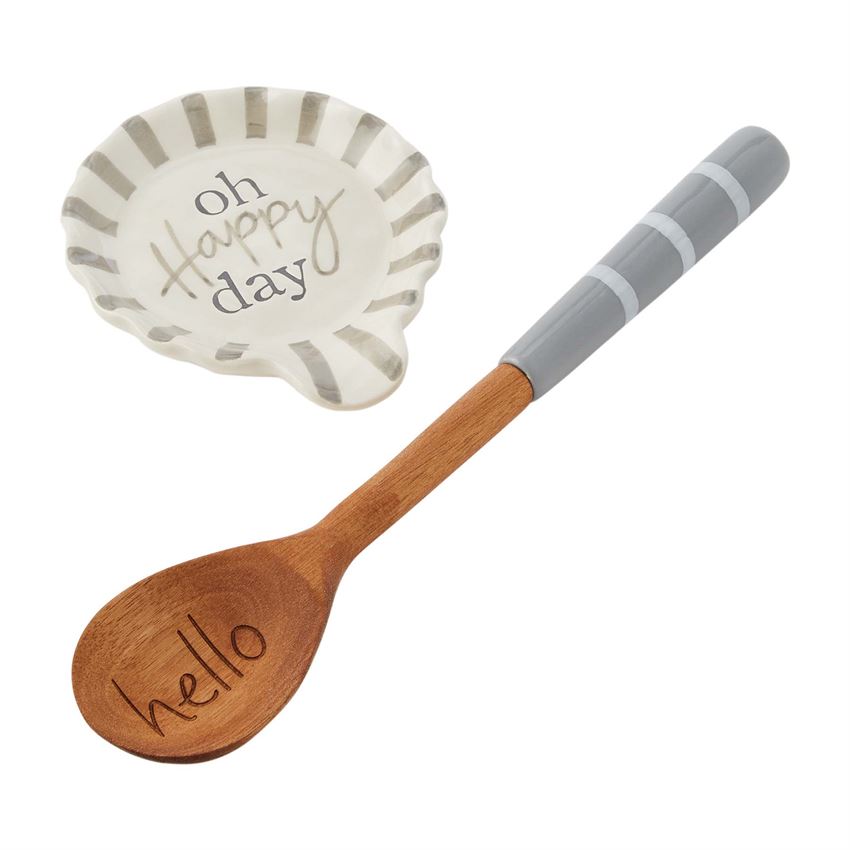 Set of three white ceramic spoon rests with ruffled edges.
