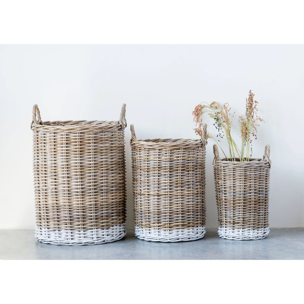 Round white-dipped natural rattan basket with handles