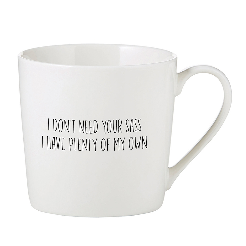 White cafe mug with the text 'I DON'T NEED YOUR SASS I HAVE PLENTY OF MY OWN' in black font.