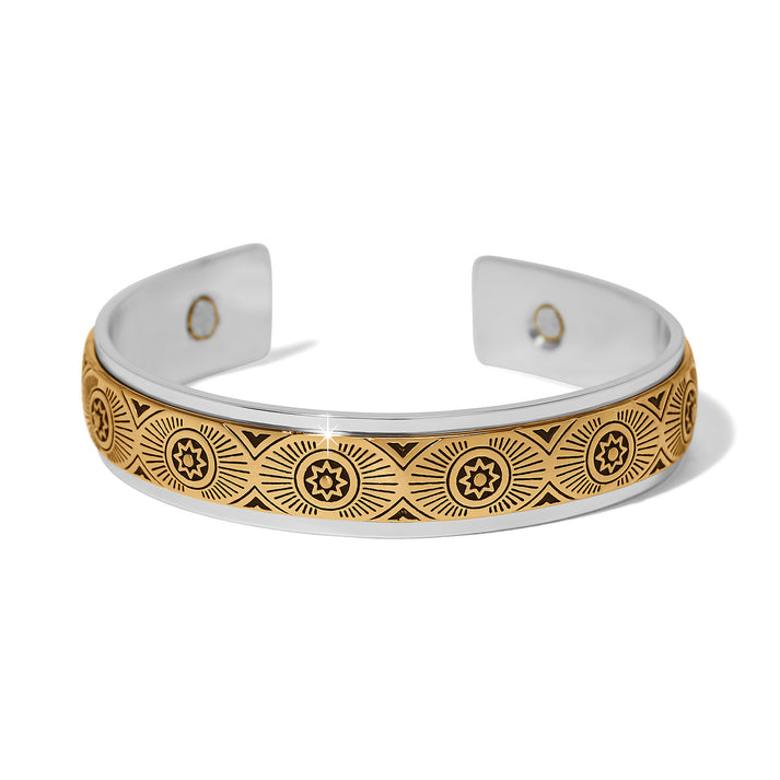 Silver-gold two-tone mosaic cuff bracelet with a half-inch wide band.
