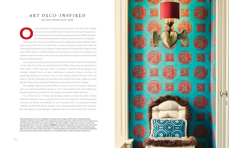 Interior design book spread featuring turquoise and red wallpaper with a winged heart wall sconce.