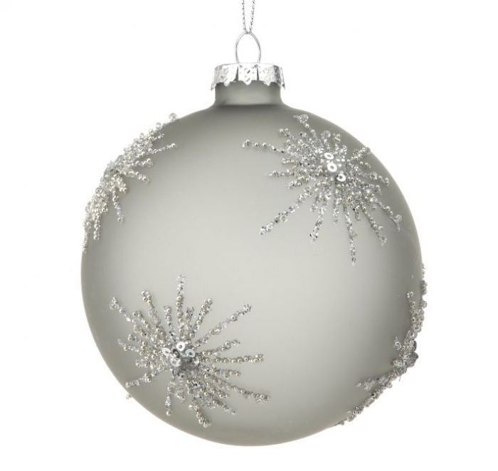 4-inch grey glass ball ornament with silver beaded starburst patterns and a silver hanging cap.
