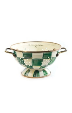 Small emerald green and white checkered colander with bronze-tone handles and base.