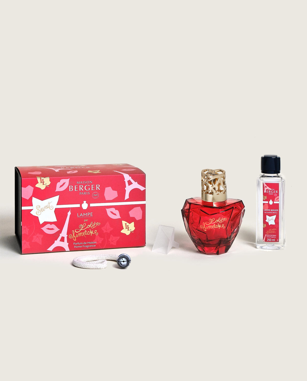 Lolita Lempicka Sweet fragrance lamp with cherry rose notes in a white ceramic burner and snuffer cap.