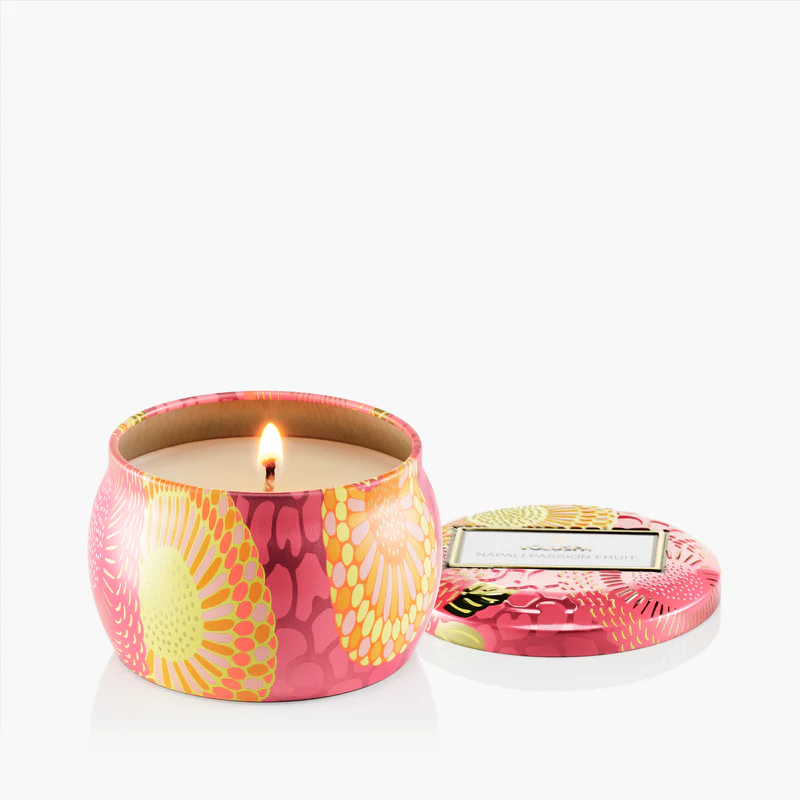 Nāpali Passion Fruit mini tin candle in a metal vessel with Japonica pattern and matching lid.