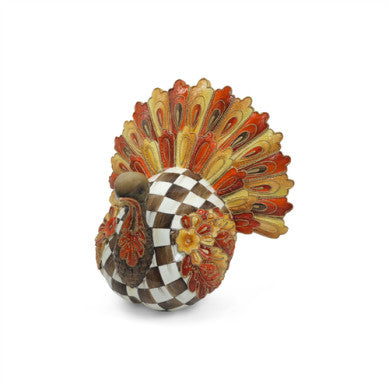 Harvest Glow Aurora turkey in a natural pose showcasing its earthy brown plumage and subtle iridescent neck feathers.