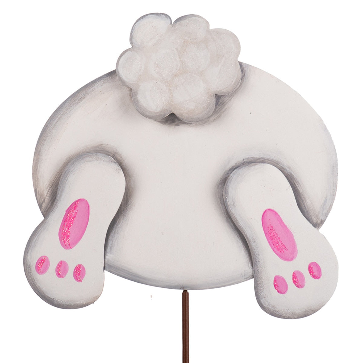White bunny tail and hind legs with pink paw prints, on a stake.