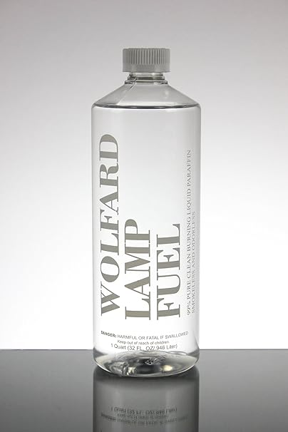 Clear glass bottle containing Wolfard lamp oil with a matching cap.