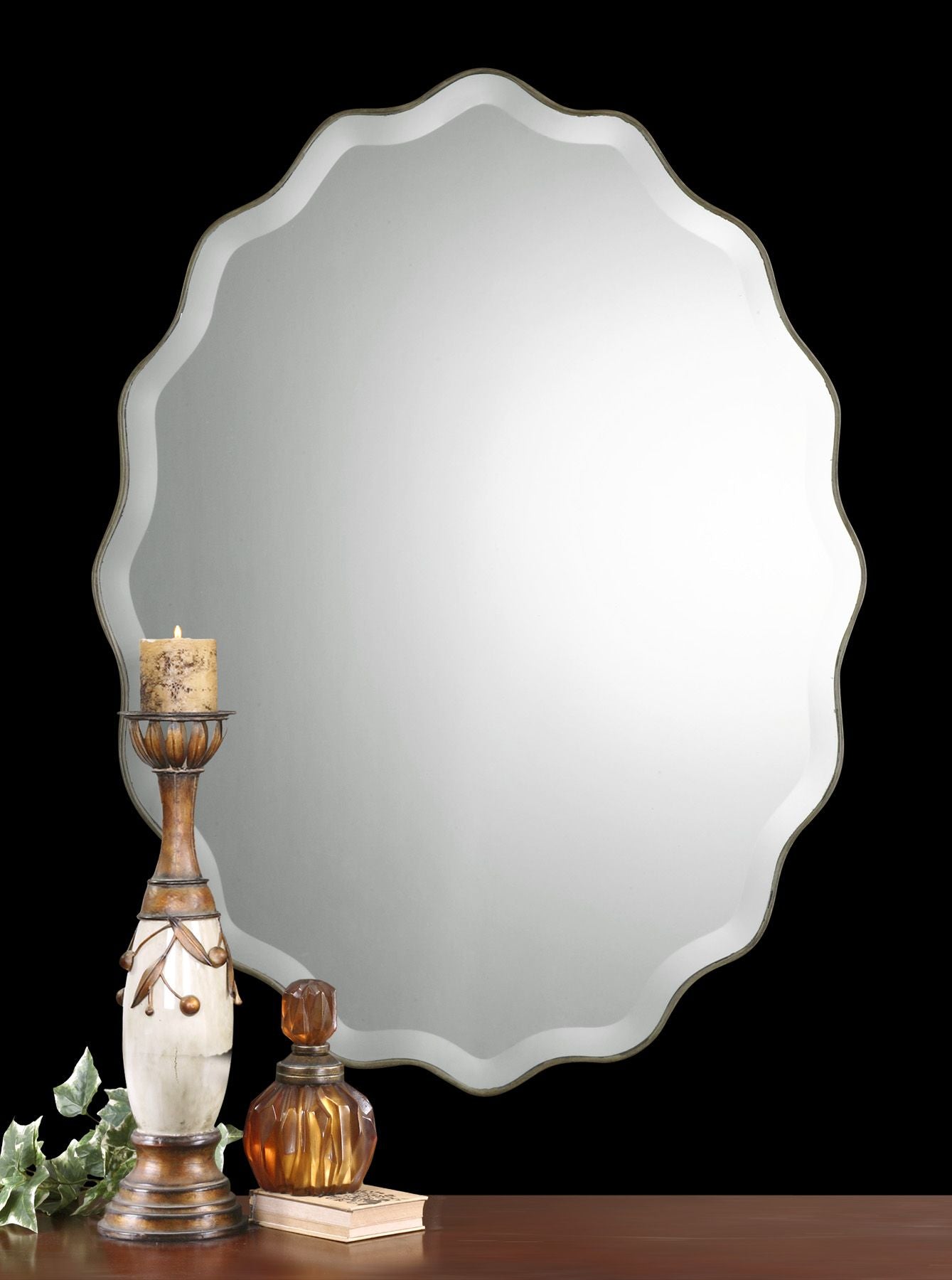 Teodora mirror with ruffled edge detail in a neutral finish