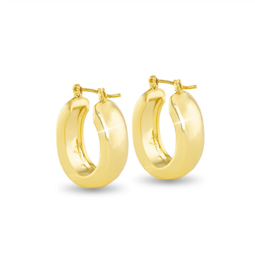 A pair of thick, polished gold oval hoop earrings with a smooth, shiny finish.