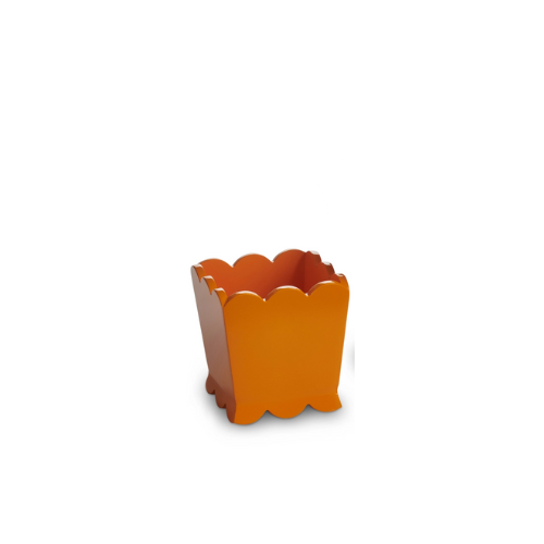 Orange scalloped edge planter made of MDF for decorative use.