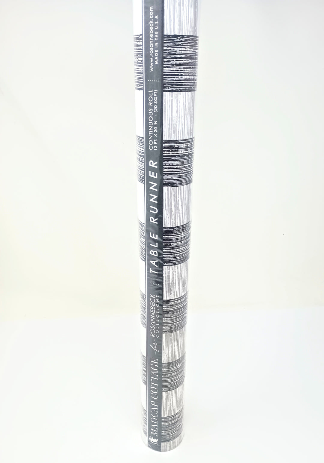Graphite Gin Lane Plaid table runner roll by Madcap Cottage for Rosannebeck Collections.