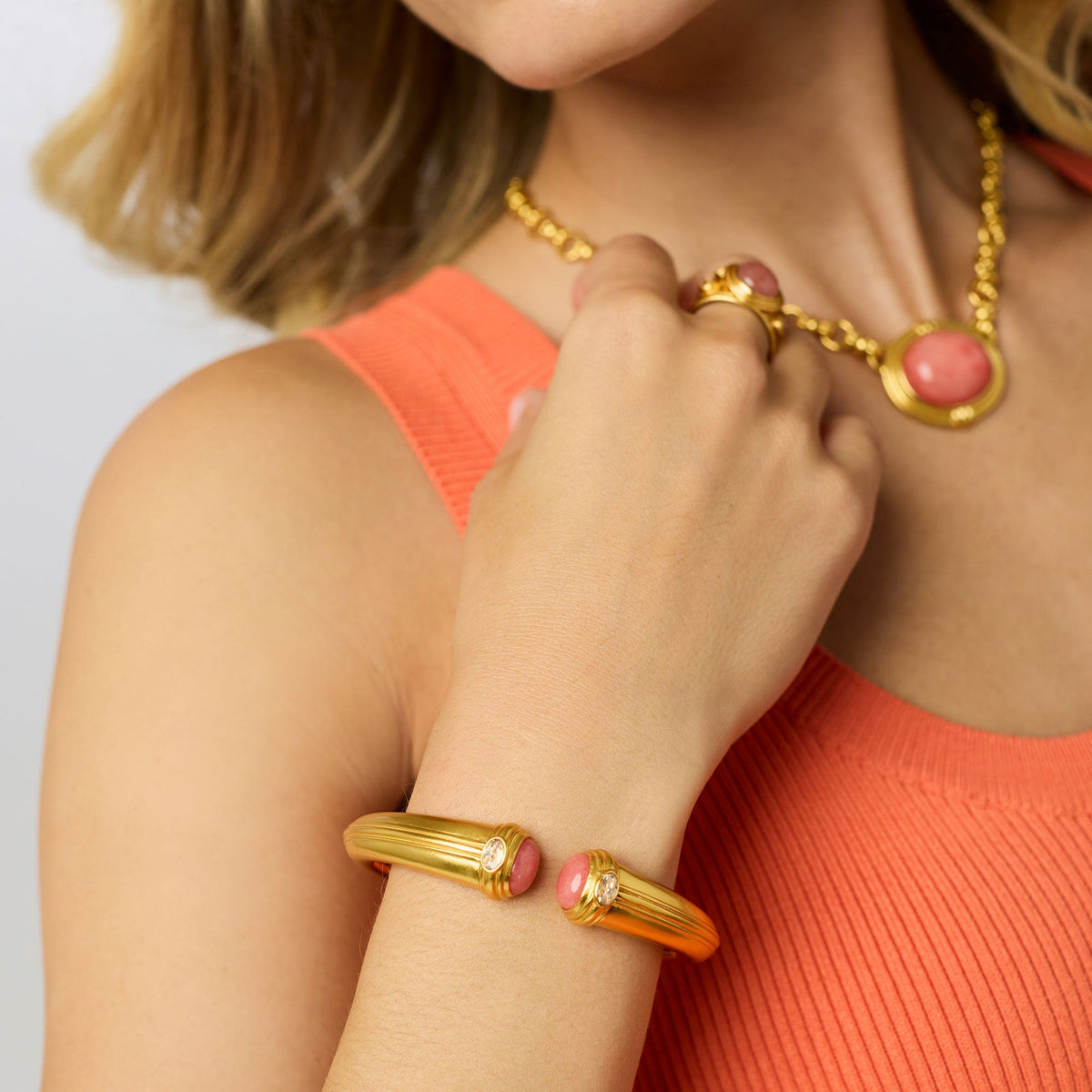 Portofino Cuff bracelet featuring a jade stone set in gold plate with an imported glass accent.