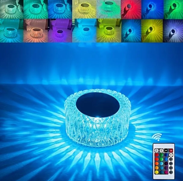 Rechargeable acrylic table light with remote control in clear finish.