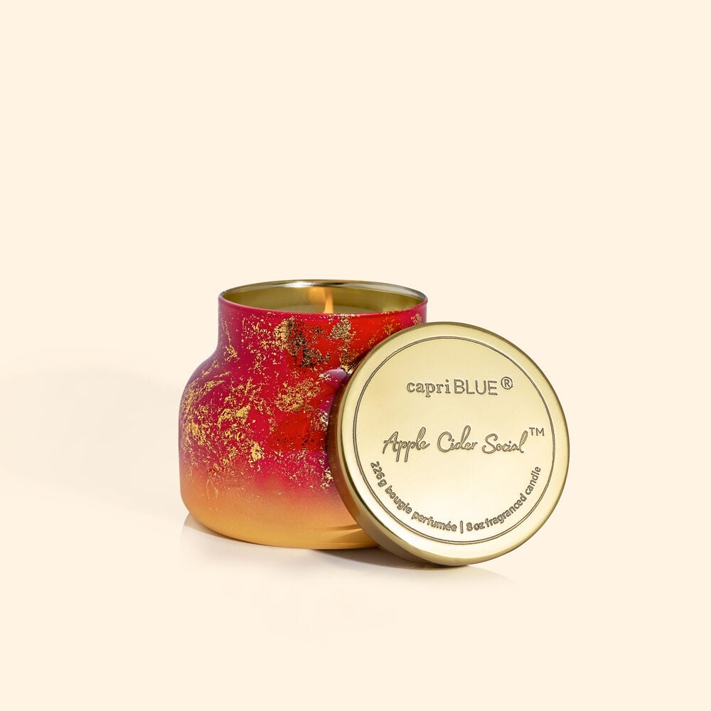Apple Cider Social Glimmer Petite Jar candle in a clear glass jar with silver glitter accents and white wax.
