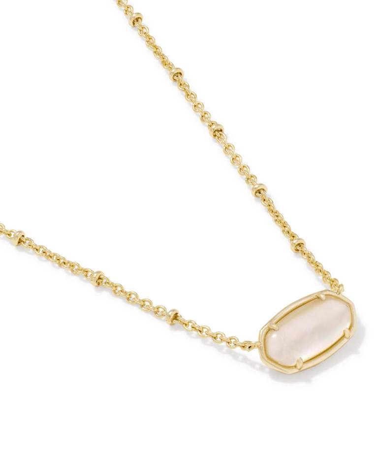 Tiger Striped Elisa Short Pendant Gold Necklace with a white stone and gold chain.