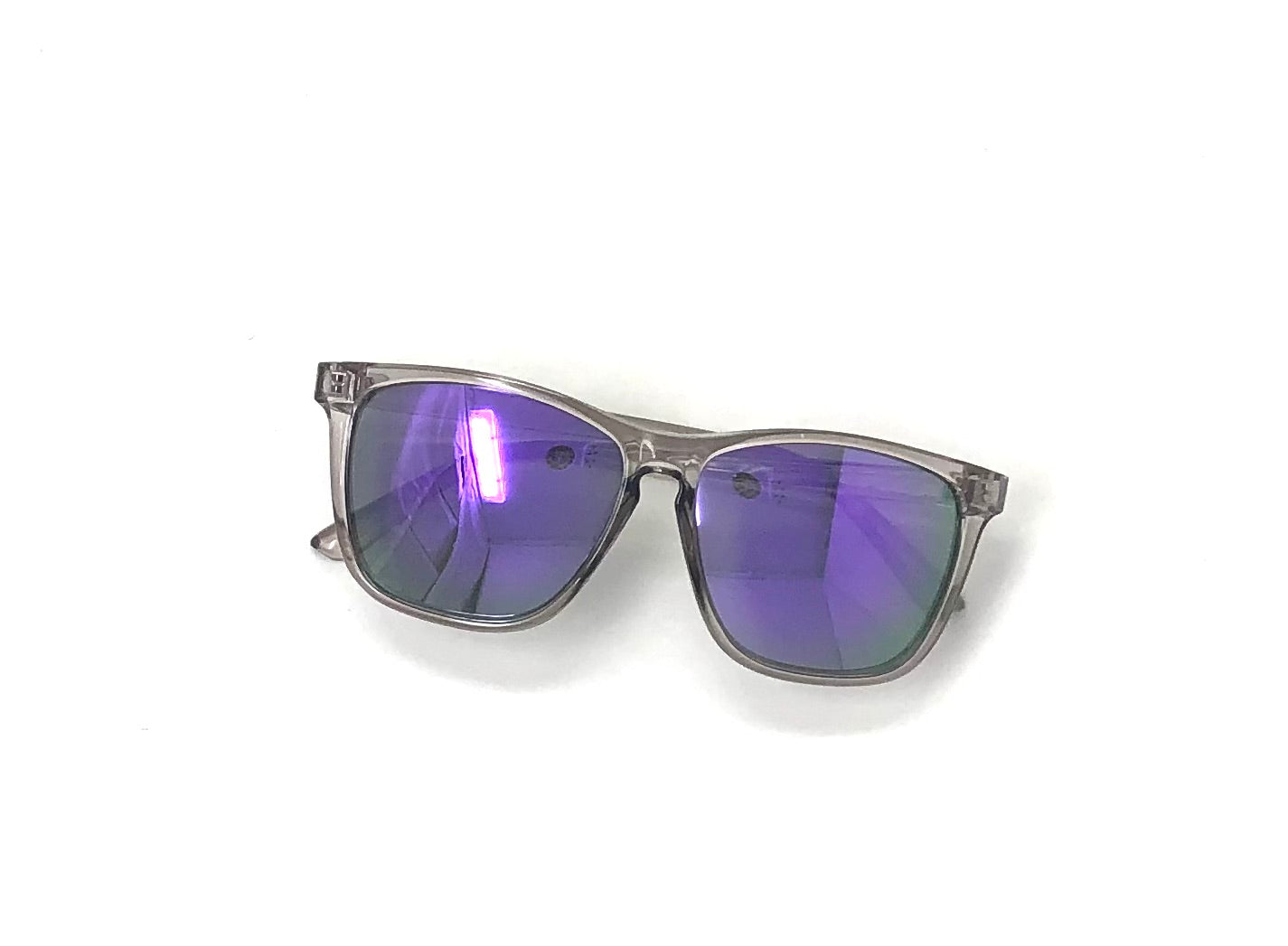 Classic bright tinted sunglasses with a classic fit frame in assorted colors offering UV400 protection.
