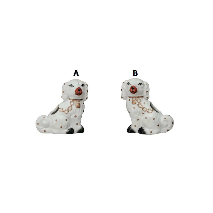 Ceramic Staffordshire dog-shaped toothpick holder in cream with black detailing.