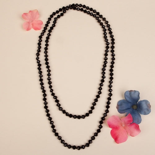60-inch long necklace featuring clear crystal beads with a beaded strand silhouette.