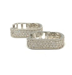 Ali flat elongated medium hoop earring in gold-tone metal with a smooth silhouette.
