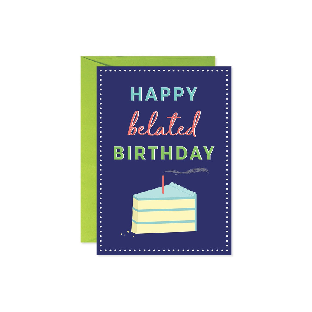 White rectangular card with 'Belated Birthday Cake' text in blue script font.