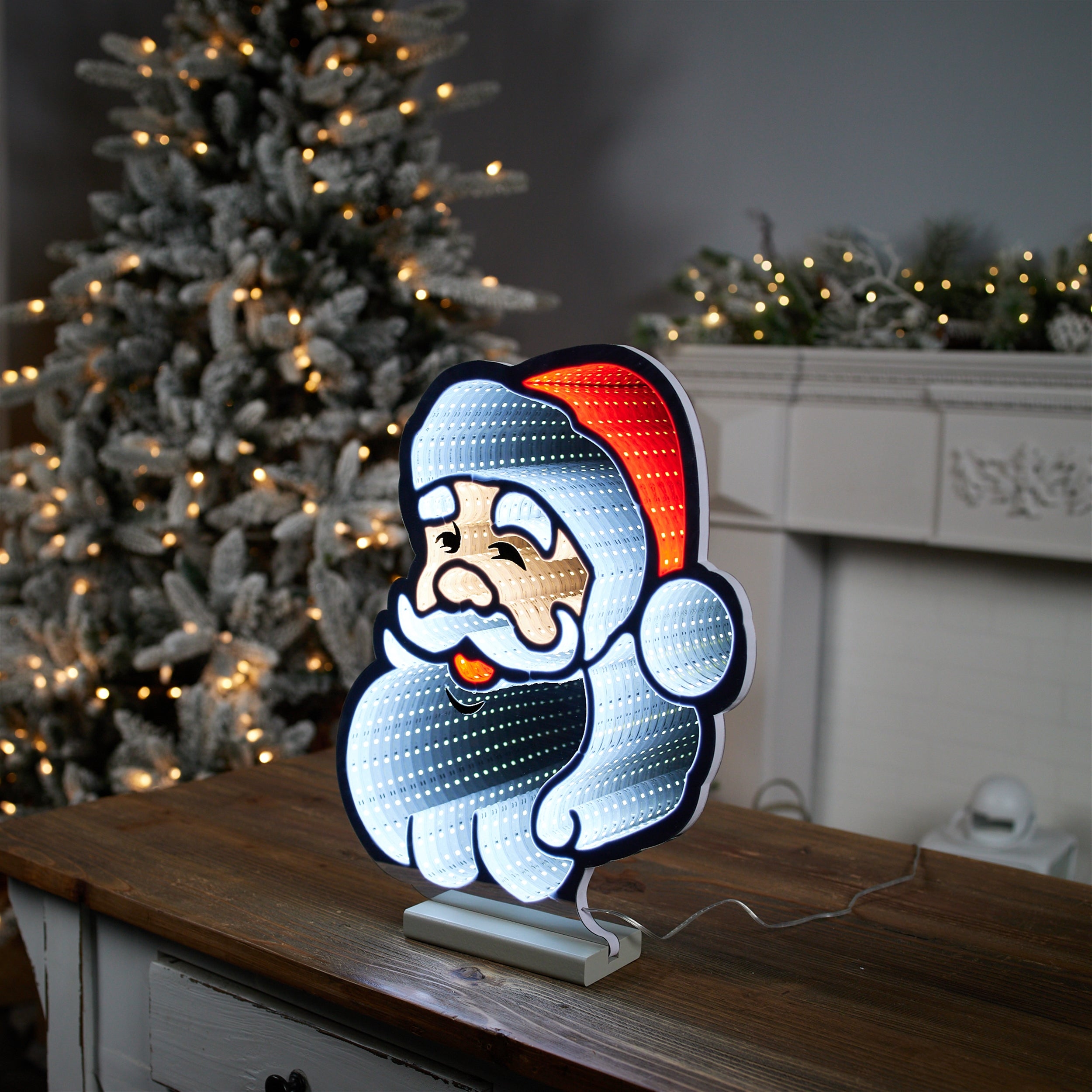 Acrylic Santa face infinity light with glowing eyes and red hat