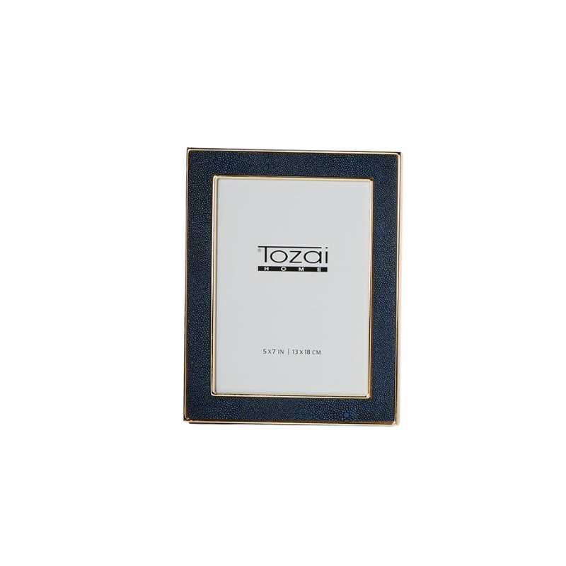 Navy blue faux shagreen photo frame with gold steel trim and a white insert.