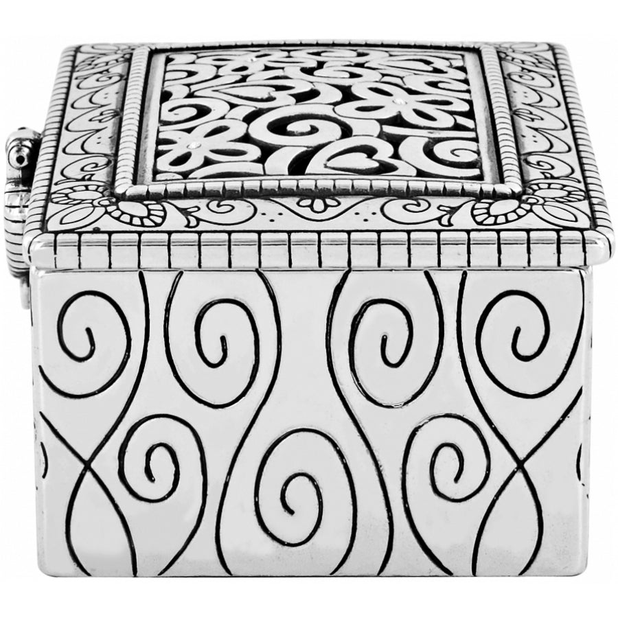 Silver-plated Lacie Daisy Jewel Box with intricate floral cutouts and spiral engraved patterns.