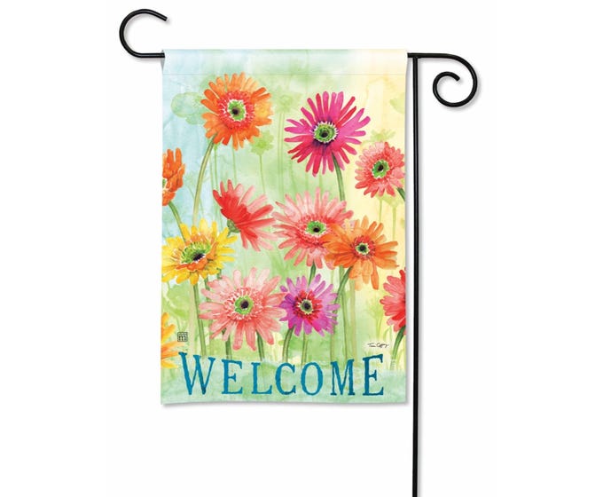 Garden flag with colorful gerbera daisies and the word "WELCOME" in blue text.