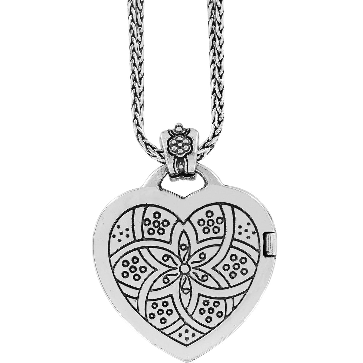 Silver plated locket necklace with a floral heart pendant holding one photo.
