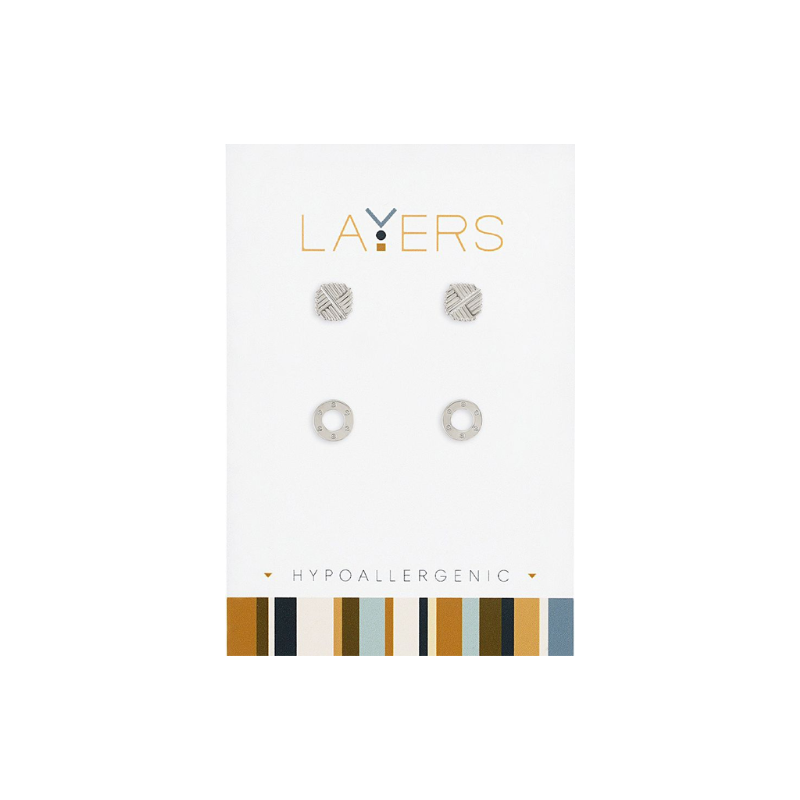 Silver Textured Disc and Open Circle Duo Stud Earrings on a white Layers brand card.