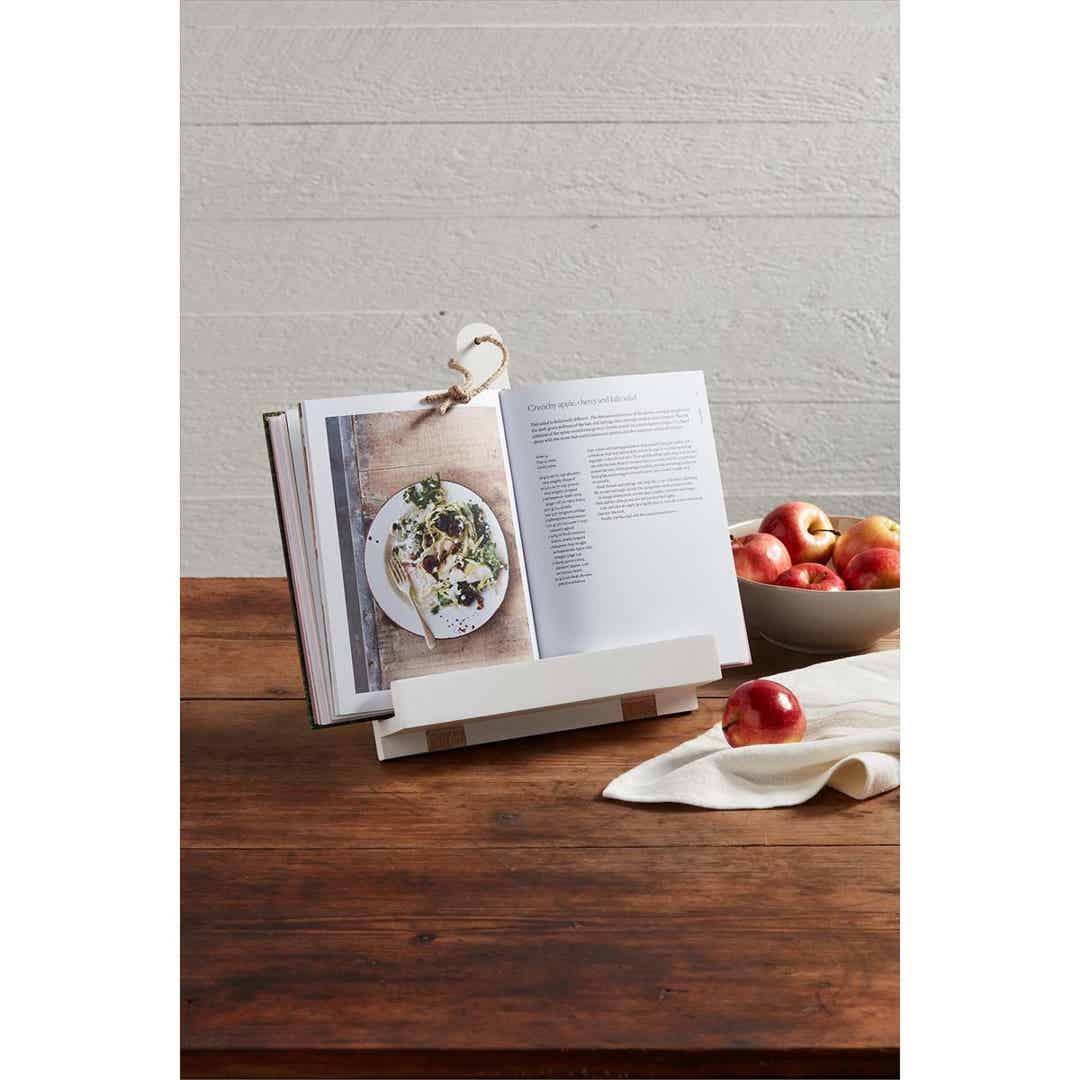 White mango wood paddle-shaped cookbook holder with a smooth rectangular silhouette.