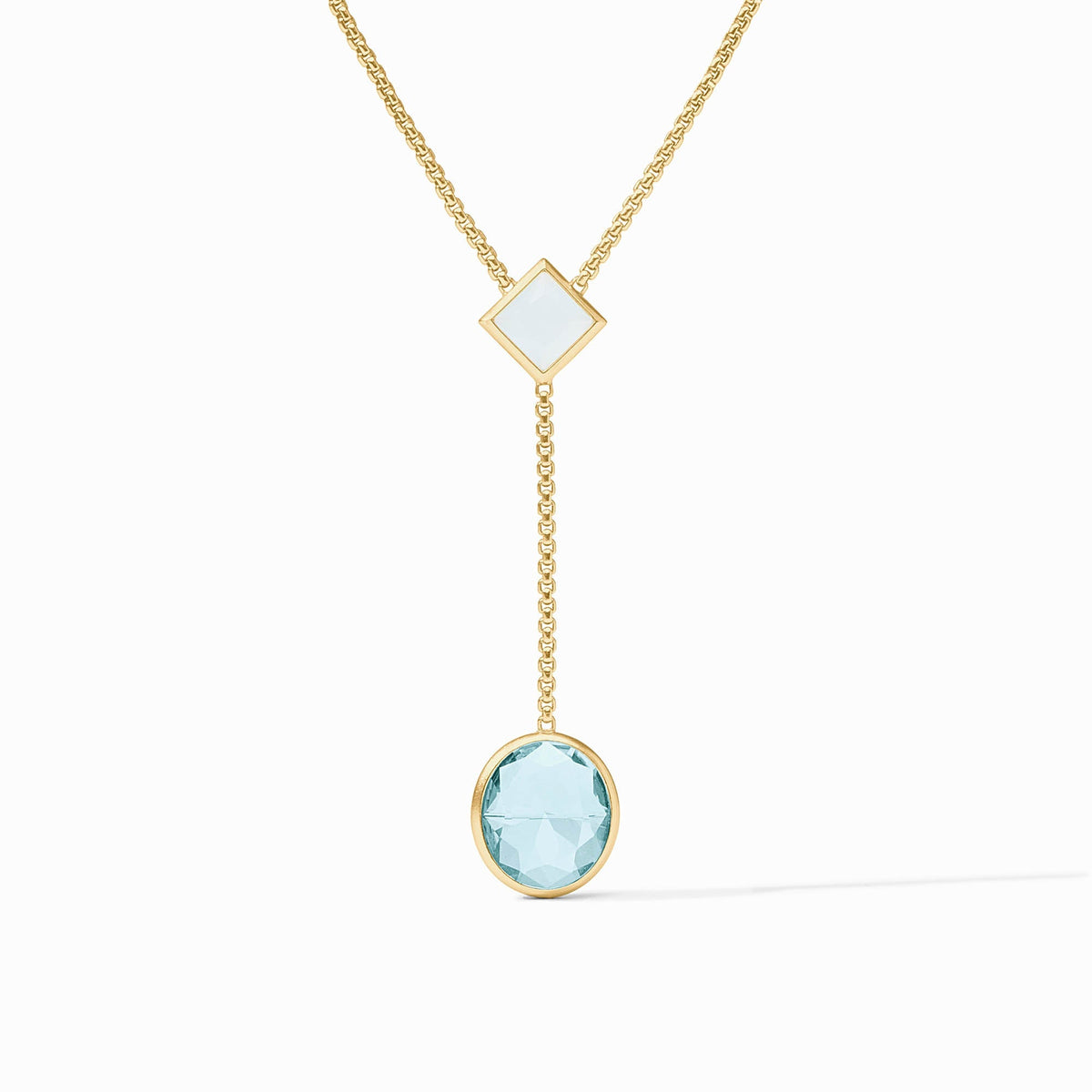 Adjustable Jolie Lariat necklace with a long chain featuring two pendant drops in gold plate and imported glass.