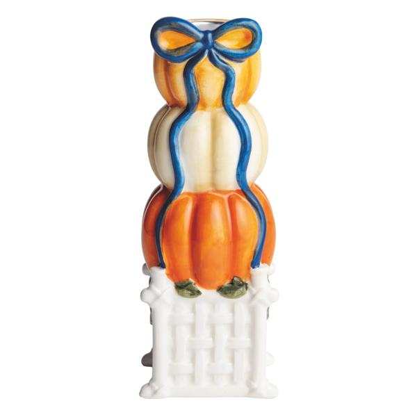 Hand-painted stoneware taper holder featuring three stacked pumpkins tied with a blue ribbon bow.