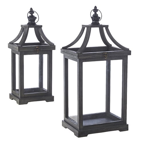 Vintage-style black lantern with weathered wood frame, iron accents, and glass panels.
