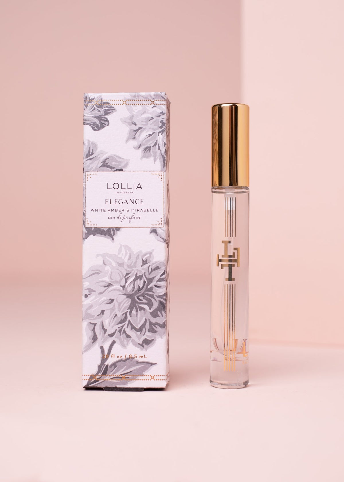 Travel Eau de Parfum in a gold-accented glass atomizer with gilded keepsake box.