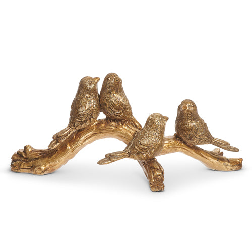 Resin bird figurine perched on a branch with natural brown tones.