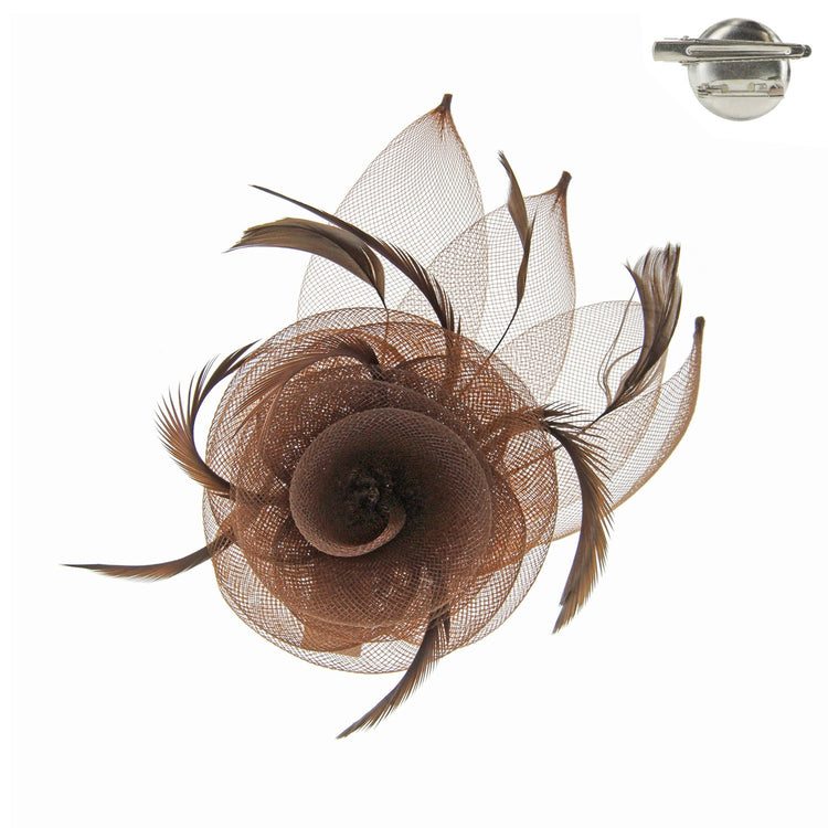 Black mesh fascinator with white floral clip attached to a black headband.