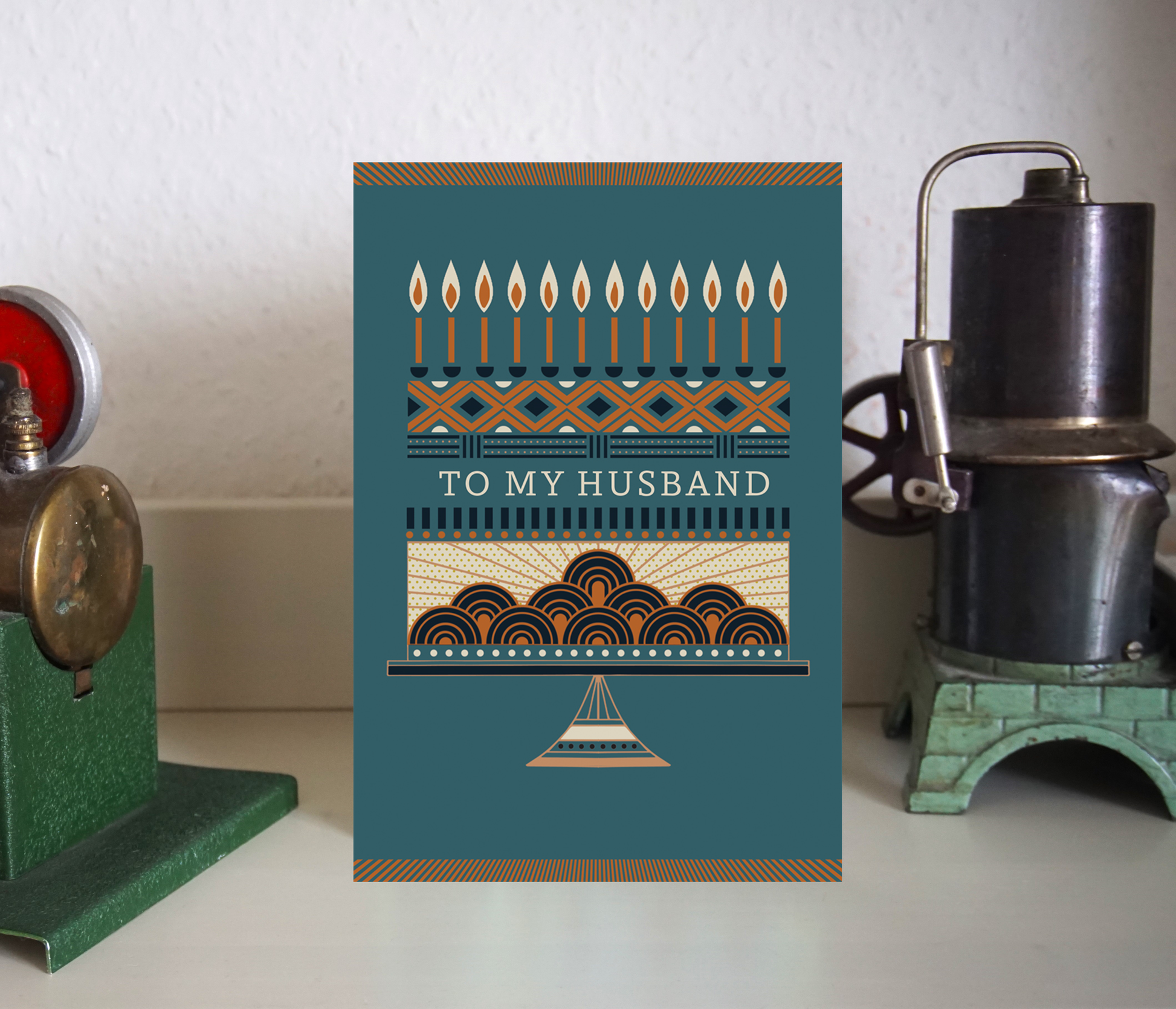Round fancy cake with foil finish; inside reads 'Happy Birthday to my love' and outside says 'To My Husband'.