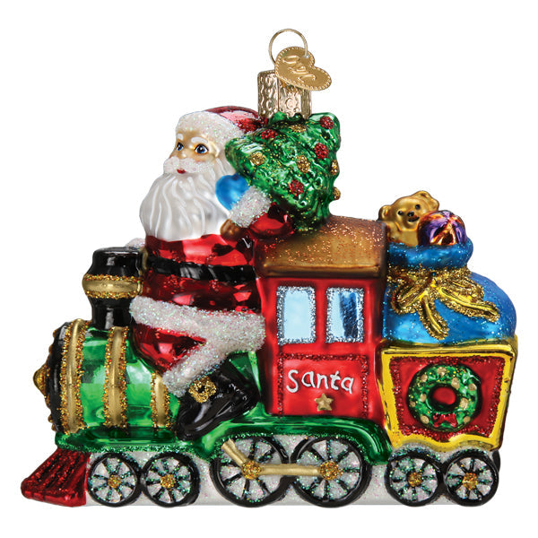 Glass Santa on Locomotive ornament featuring a red and green train with a teddy bear and tree.