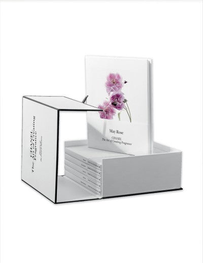 Chanel fragrance gift set featuring six books on rose, iris, jasmine, geranium, tuberose, and creators.