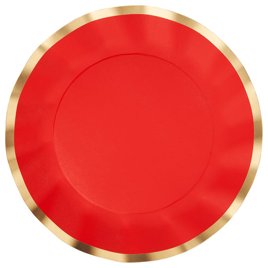 Wavy 10-inch scarlet red paper dinner plate with a gold foil rim.