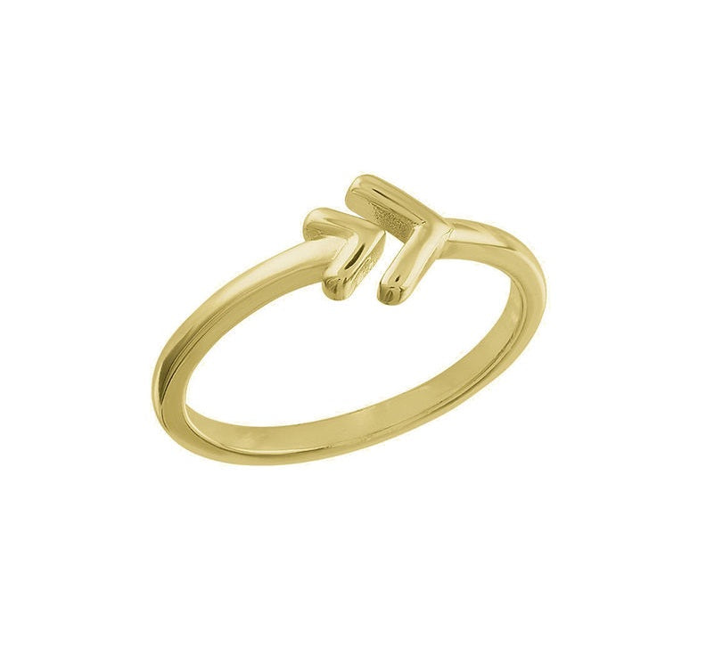 Gold layered arrow ring with a sleek silhouette