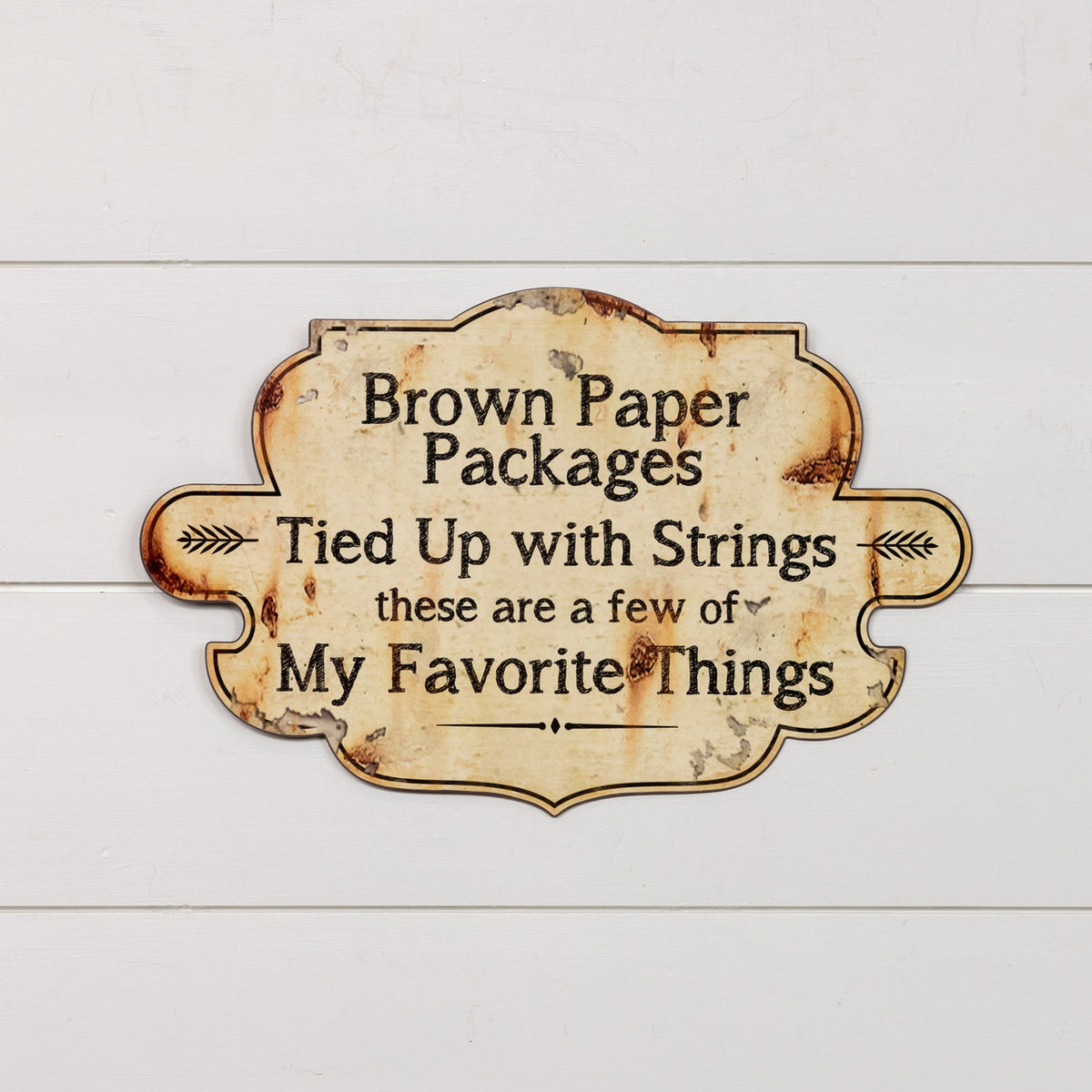 Metal wall sign with a decorative frame design